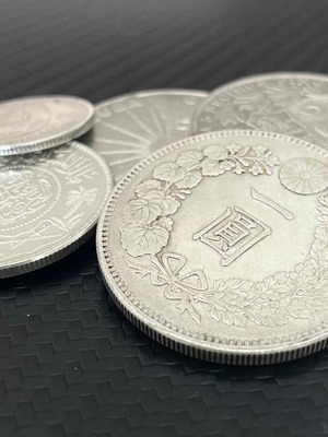 Silver coins from Cuba, Peru, Japan, Saudi Arabia