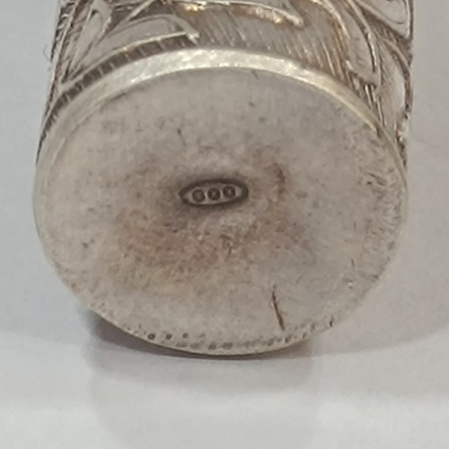 Antique silver 800 needle case with embossed floral decoration
