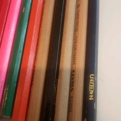 Set of colored thick pencils used