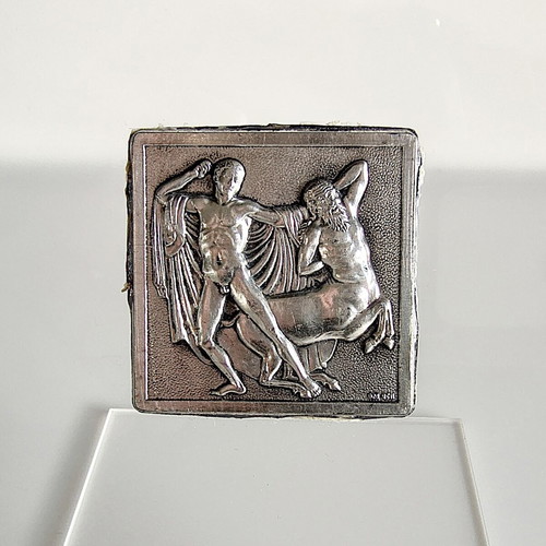 Set of 2 stands with 2 silver Parthenon sculpture depictions