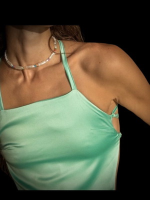 Crop Top satin mint color, new, ties at back, fits 75B and smaller