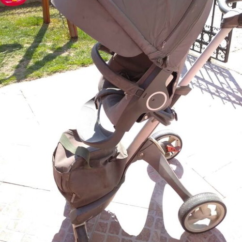 Stokke stroller with scooter, cup holder, umbrella and car seat