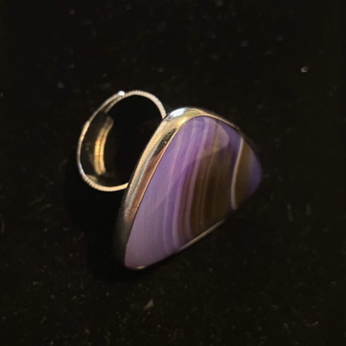 Handmade ring with steel setting and purple stone appearance like new