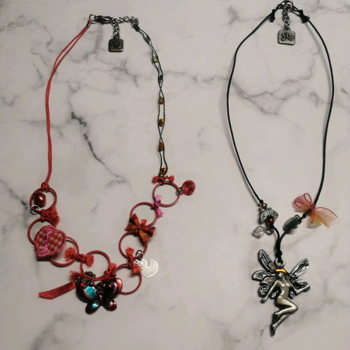 Necklaces with butterfly and fairy motifs like new, set of 2