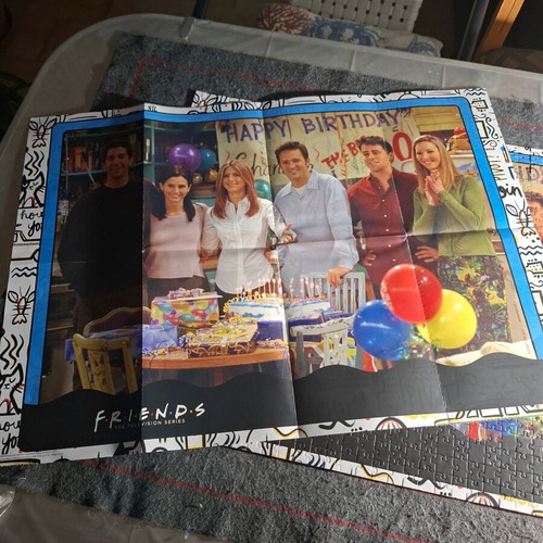 Puzzle Friends 1000 pieces like new with large collectible poster