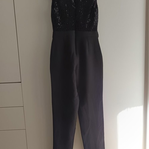 Black jumpsuit size M like new with sequins