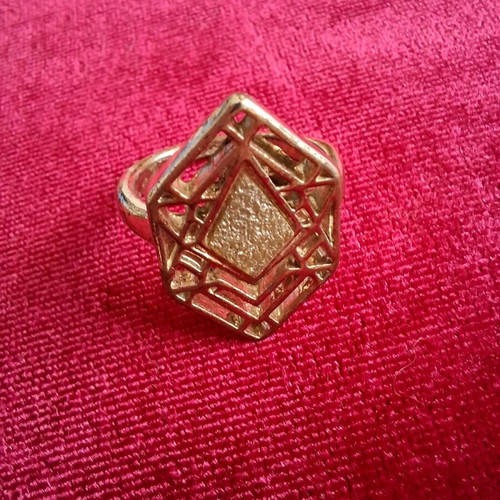 Hexagon ring used, gold color