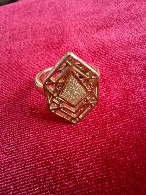 Hexagon ring used, gold color