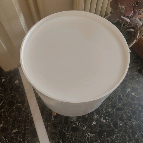 Side table used, round with storage