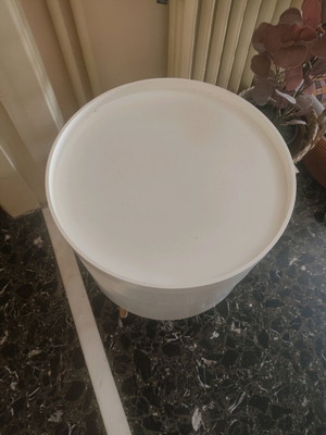Side table used, round with storage