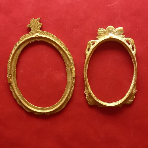 Set of two brass frames