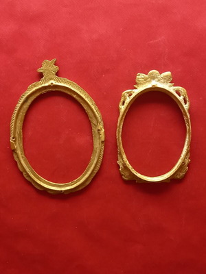 Set of two brass frames