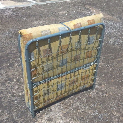 Metal folding bed with mattress used, sturdy and comfortable