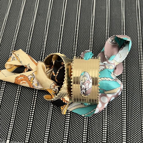 Women's gold metal bracelets with colorful silk scarves, like new