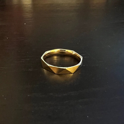 Gold ring like new, possibly stainless steel