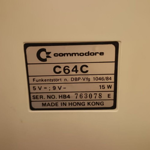 Commodore 64C used with original power supply, cassette player, and manuals