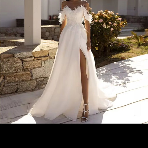 Wedding dress handmade, like new, size S-M, white with feather details