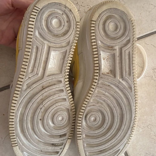 Nike athletic shoes used, white and yellow, size 38