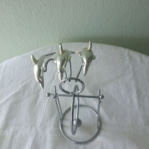 Table decor with 3 dolphins used