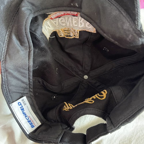 Magners cider branded hat used with small discoloration
