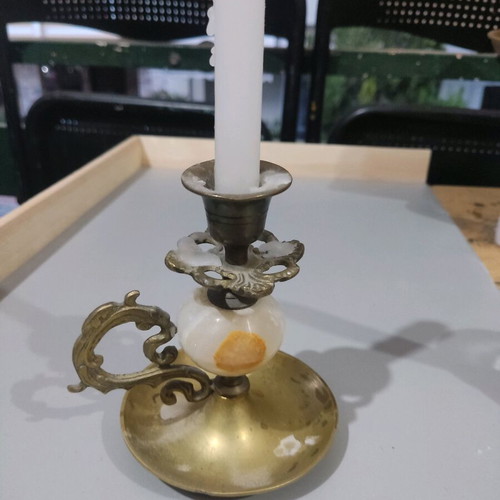 Brass ornate candlestick used