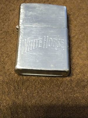 White horse lighter used, needs flint