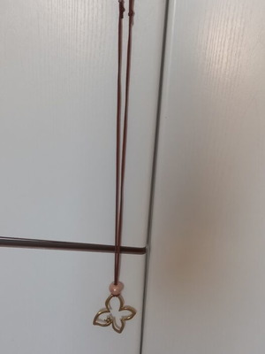 Necklace with flower pendant