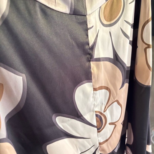 Women's skirt knee-length, airy, flared, like new, with large floral print