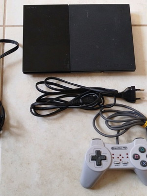 PlayStation 2 used with cables and controller, fully functional