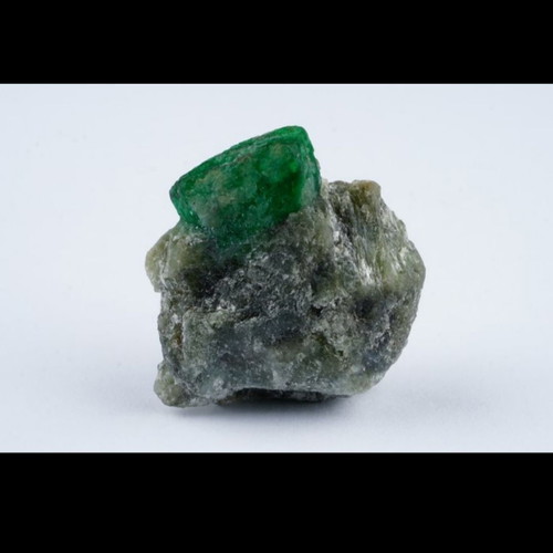 Emerald mineral in rock new with deep green color