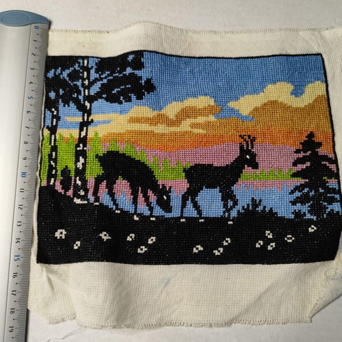 Vintage embroidery landscape with deer and sunset used