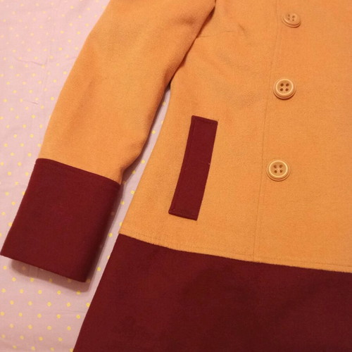 Beige coat with burgundy size medium like new