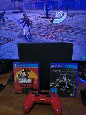 PlayStation 4 Slim used with 2 games