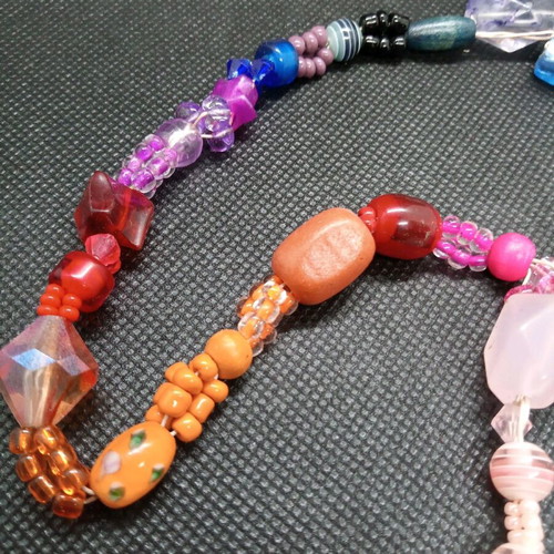 Necklace with colorful beads and moss agate semiprecious stone