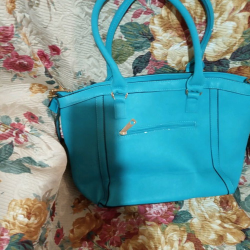 Bag with long strap with small signs of wear