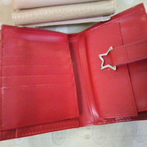 Women's wallet used, red with multiple compartments