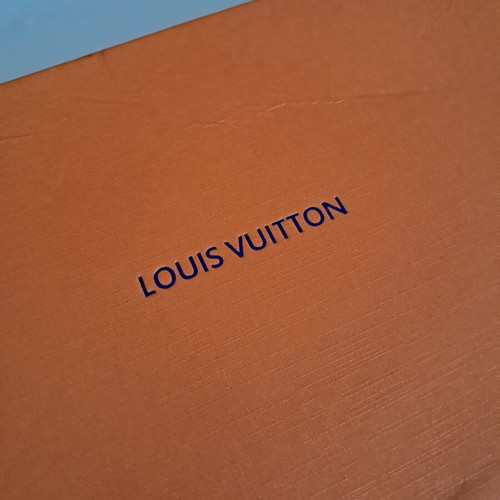 Louis Vuitton leather belt with interchangeable buckles