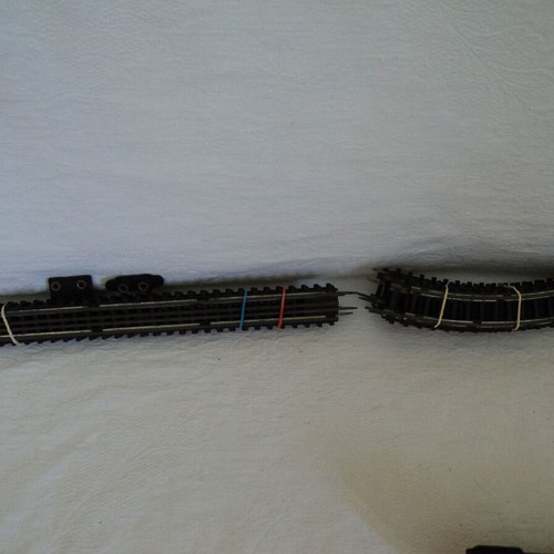 Train set used, engine with three wagons and tracks made in Japan