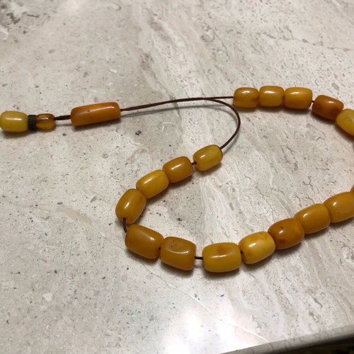 Worry beads used from royal amber with silver logo
