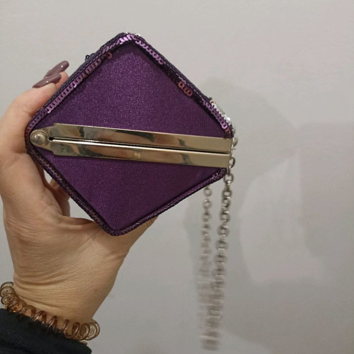 Clutch bag polygonal like new with purple sequins