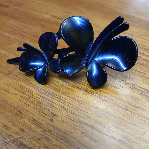 Hair clip plastic black with butterflies used