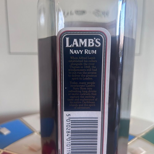 Lamb’s Navy Rum like new with hexagonal bottle