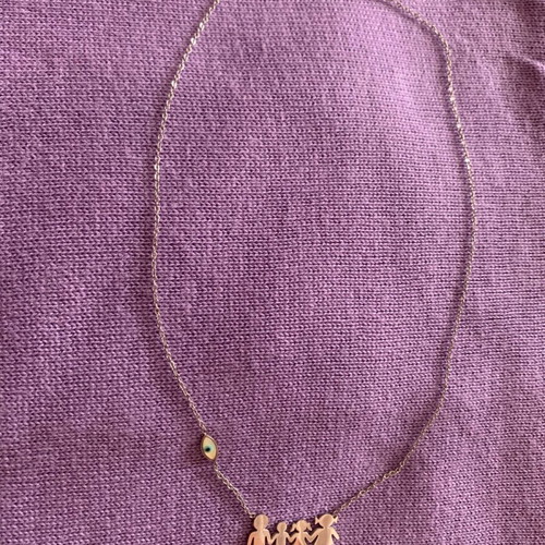 Family necklace made of steel like new with silver eye charm