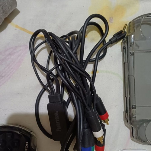 Sony PSP handheld consoles with accessories and games