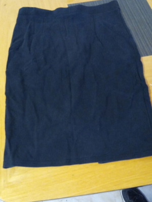 Black knee-length skirt with zip, size 12