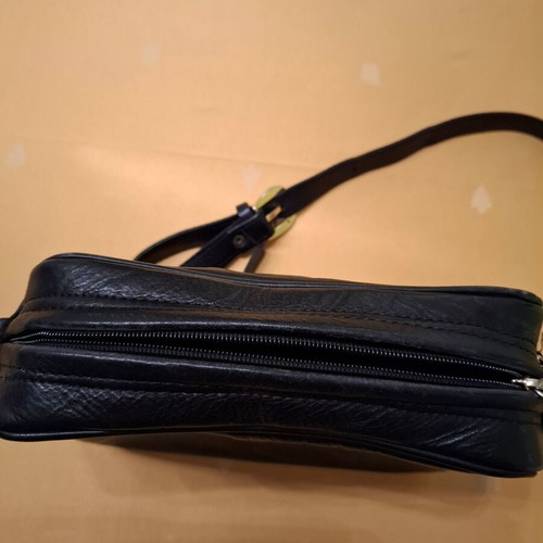 Shoulder bag black genuine leather like new with elephant detail