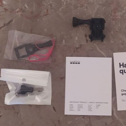 GoPro HERO7 Black camera like new with Mic Adapter and accessories
