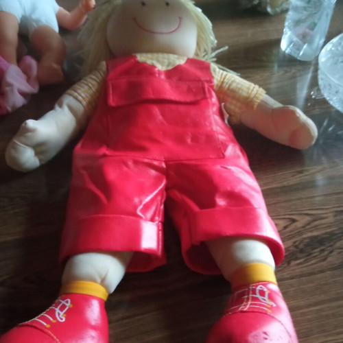 Children's doll like new, fabric with leatherette