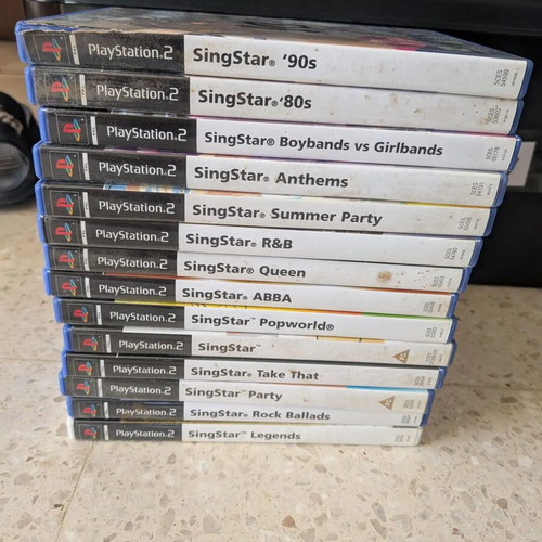 Singstar games bundle for PlayStation 2, used, 14 discs