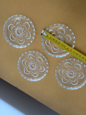 Set of 4 vintage glass coasters like new with embossed design